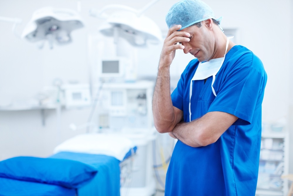 Physician thinking about records for a Maryland certificate of merit case